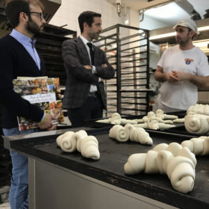 Preparation of bread during the meeting with a local baker in Bologna