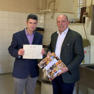 Delivery of certificate of merit to local bakers in Carrara Italy