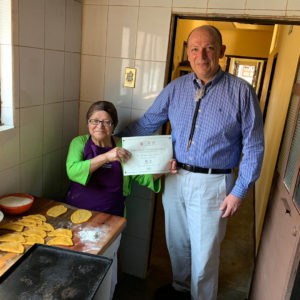 Delivery of certificate of merit to local baker in San Cristobal de las Casas in Mexico